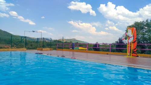 View of swimming pool against sky