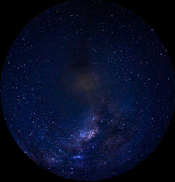 Low angle view of star field against sky at night