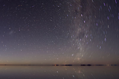 Scenic view of star field against sky at night