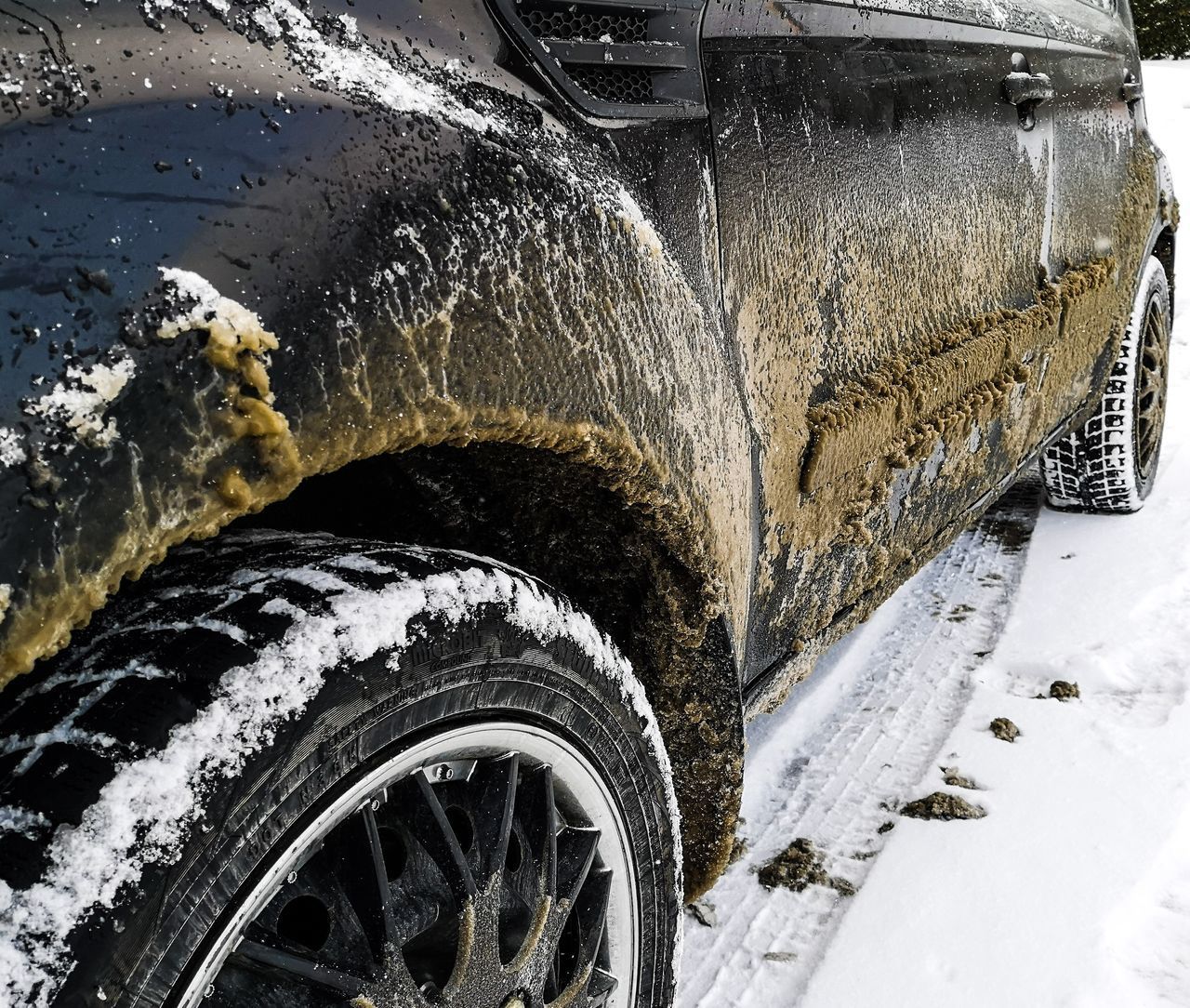 CLOSE-UP OF SNOW ON ROAD