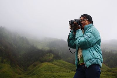 Man photographing on camera