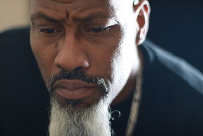 Close-up of thoughtful bearded man