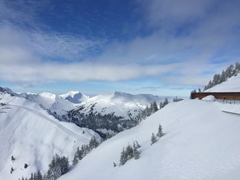 Snow covered mountains against sky