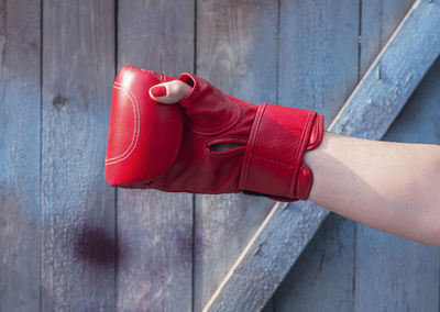 Woman wearing boxing glove