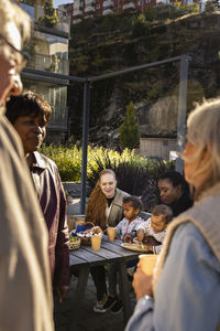 Group of neighbors in courtyard