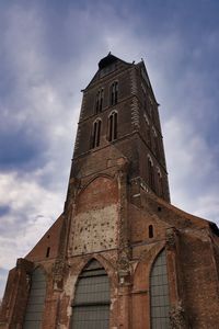 Low angle view of historic building against sky