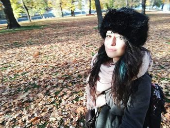 Young woman in forest during autumn