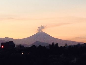 Scenic view of mountains at sunset