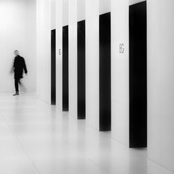 Man walking in corridor