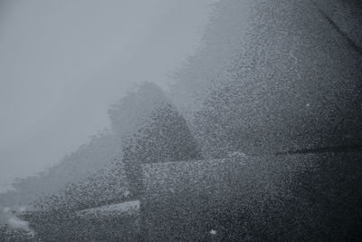 Full frame shot of raindrops on snow