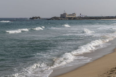 Scenic view of sea against clear sky