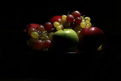 Close-up of apples on black background