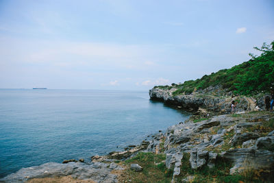 Scenic view of bay against sky