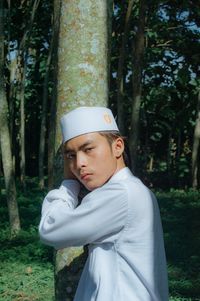 Portrait of young people muslim standing in forest