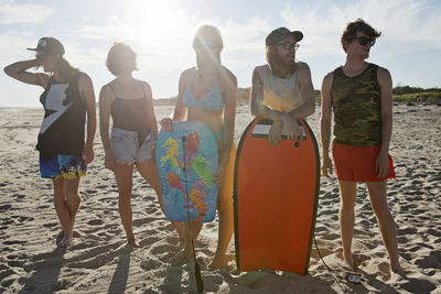 Friends hanging out on a beach