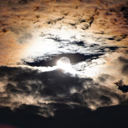 Low angle view of moon in sky at night