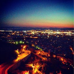 View of illuminated cityscape at night