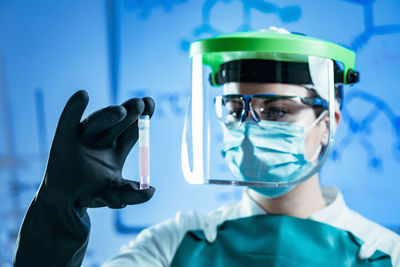 Female scientist experimenting in laboratory