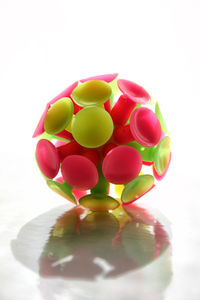 Close-up of multi colored pencils over white background