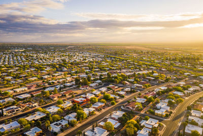 High angle view of cityscape against sky during sunset