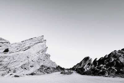 Scenic view of mountains against blue sky