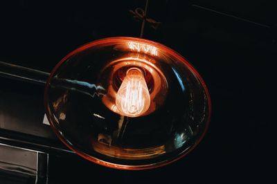 Close-up of illuminated light bulb