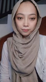 Portrait of smiling young woman