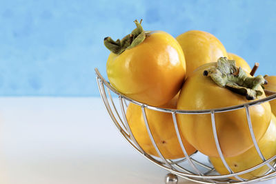 Close-up of oranges on table