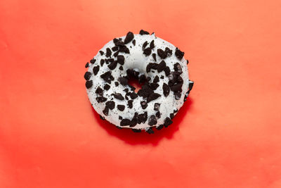 High angle view of ice cream against orange background