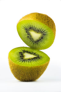 Close-up of fruits against white background