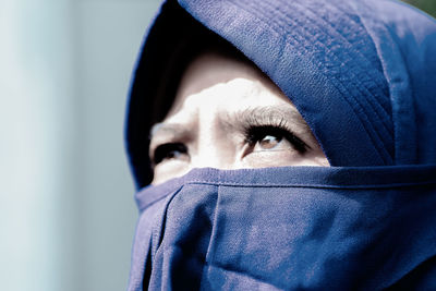 Close-up of woman wearing hat