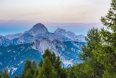 Scenic view of mountains against sky during sunset