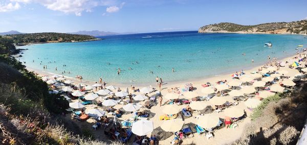 High angle view of people on beach against sky