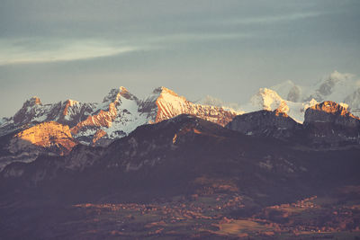 Scenic view of mountains against sky during sunset