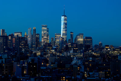 Illuminated buildings in city at night