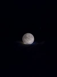 Scenic view of moon against sky at night