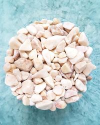 High angle view of pebbles on table