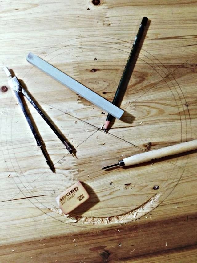 wood - material, wooden, still life, high angle view, table, wood, close-up, indoors, pencil, plank, paper, no people, directly above, art and craft, communication, work tool, text, single object, textured, ideas