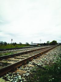 Railway tracks against sky