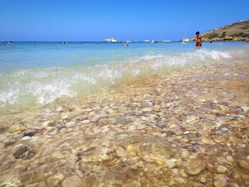 Scenic view of sea against clear sky