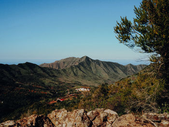 Scenic view of mountains against clear sky