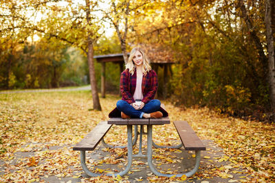 Woman sitting in park