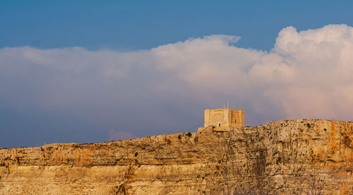 Low angle view of fort against sky