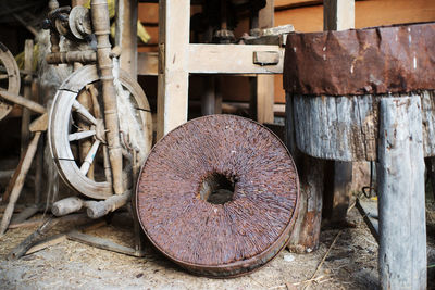 Close-up of old rusty metal wheel outdoors