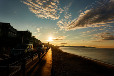 Scenic view of sea against sky during sunrise 