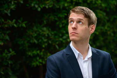 Portrait of young man looking away