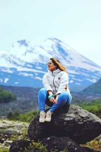 Man sitting on rock