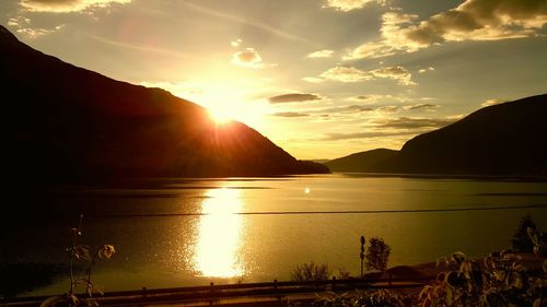 Scenic view of sunset over lake