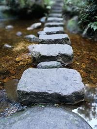 Close-up of stones on footpath