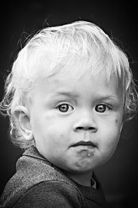 Close-up portrait of cute baby looking away